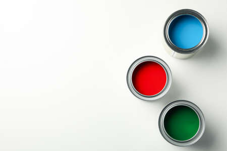 Cans of different paints on white background, top viewの写真素材