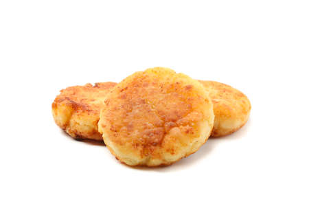 Cottage cheese pancakes isolated on white backgroundの写真素材