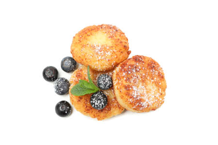 Cheese pancakes, blueberry and mint isolated on white background