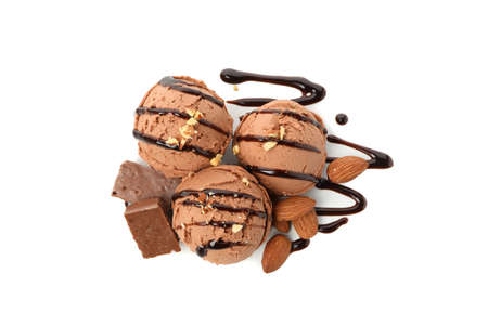 Ice cream balls, chocolate and almond isolated on white background