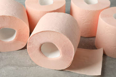 Toilet paper on grey background, close upの写真素材