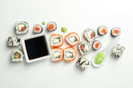 Delicious sushi rolls on white background, top view. Japanese foodの写真素材