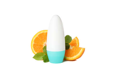 Body deodorants roll-on and orange slices isolated on white background