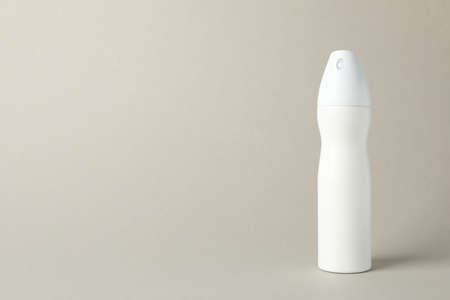 Body deodorant on gray background, blank space for textの写真素材