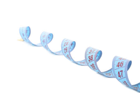 Measuring tape isolated on white background. Weight loss