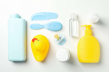 Flat lay with baby hygiene accessories on white backgroundの写真素材