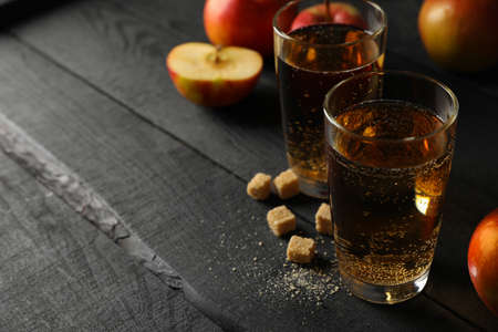 Composition with cider, sugar and apples on wooden backgroundの写真素材