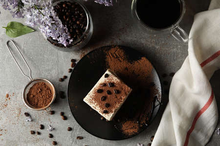 Composition with tasty tiramisu and lilac. Delicious dessertの写真素材