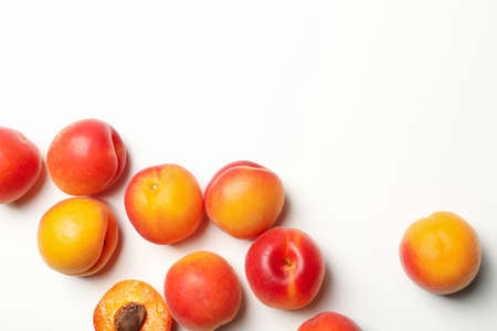 Fresh tasty apricots on white background, top viewの写真素材
