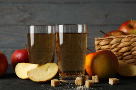 Composition with cider, sugar and apples on wooden backgroundの写真素材
