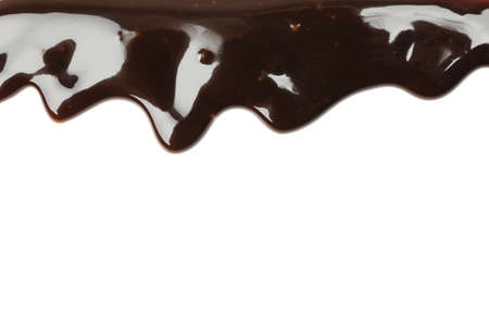 Tasty melted chocolate isolated on white background
