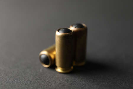 Rubber bullets on black background, close upの写真素材