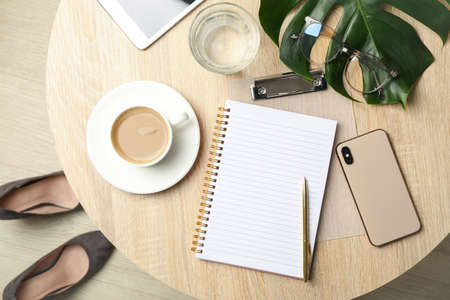 Composition with business accessories on wooden table. Blogger workspace