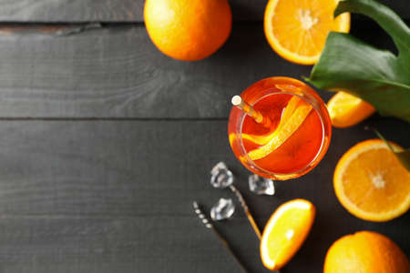 Composition with aperol cocktail on wooden background, top viewの写真素材