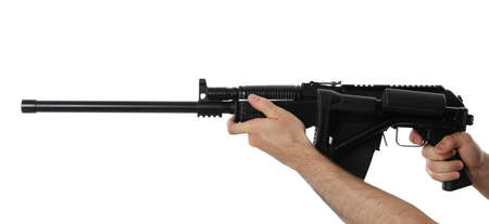 Male hands hold automatic gun with folding butt, isolated on white background