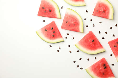 Composition with fresh watermelon slices on white background, top view