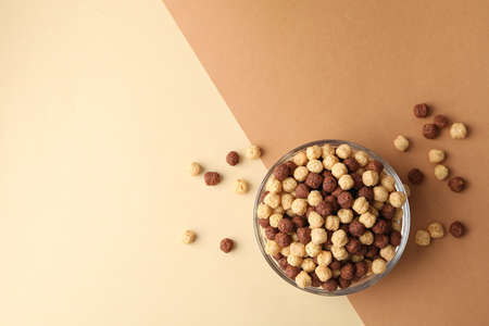 Bowl with corn balls on two tone backgroundの写真素材