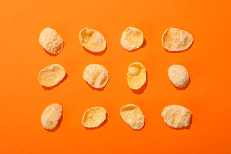 Flat lay with muesli on orange backgroundの写真素材