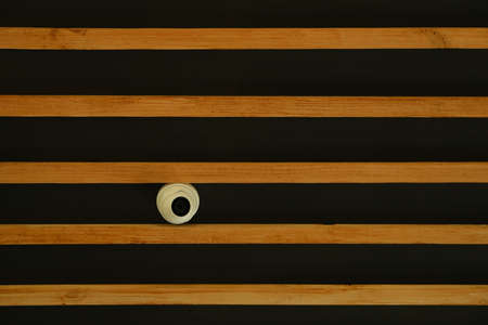 Black background with horizontal wooden inserts