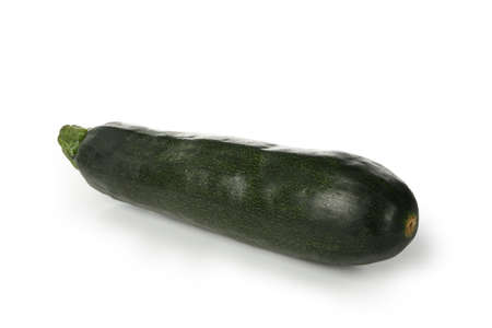 Fresh green zucchini isolated on white backgroundの写真素材