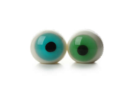 Two zombie eyes isolated on white backgroundの写真素材