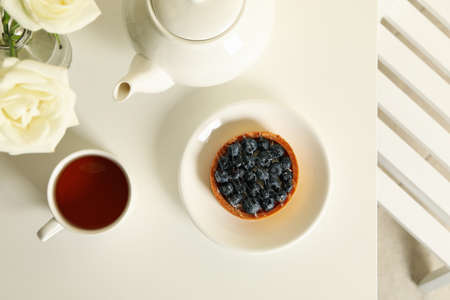 Concept of breakfast with blueberry pie on white tableの写真素材
