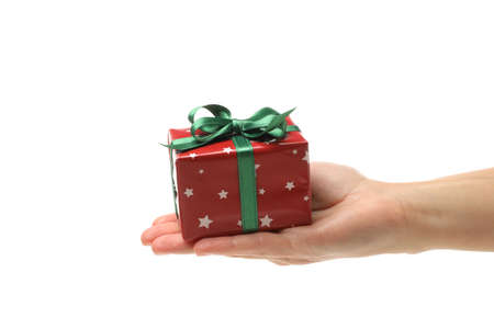 Female hand hold gift box, isolated on white backgroundの写真素材
