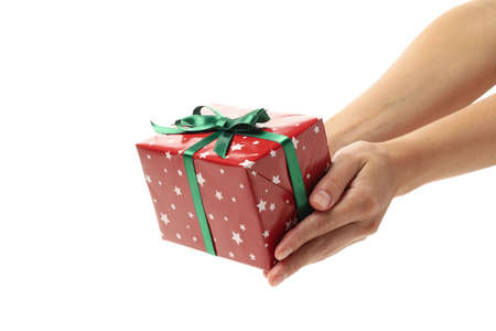 Female hands hold gift box, isolated on white background