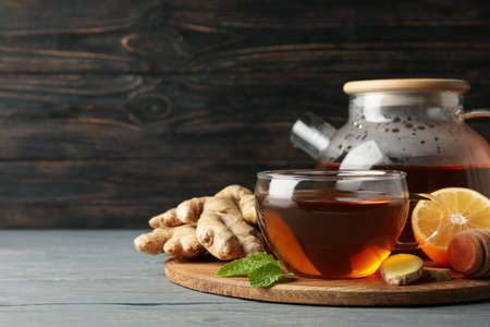 Concept of breakfast with ginger tea on wooden backgroundの写真素材