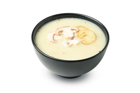 Bowl with tasty mushroom soup isolated on white backgroundの写真素材