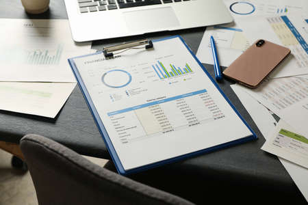 Concept of financial planning on gray wooden tableの写真素材