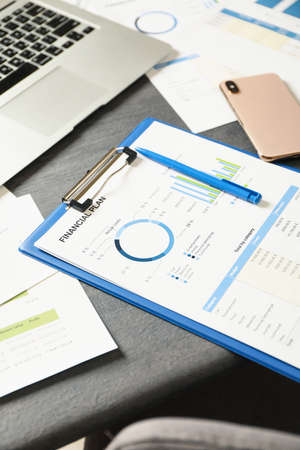 Concept of financial planning on gray wooden table