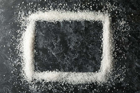 Square made of sea salt on black smokey backgroundの写真素材
