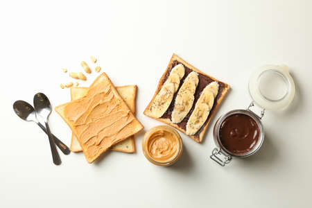 Concept of breakfast with toasts with peanut butter and chocolateの写真素材