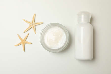 Cosmetics and sea stars on white backgroundの写真素材