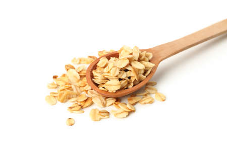 Wooden spoon with granola isolated on white background