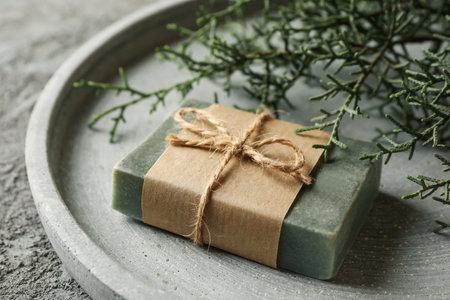 Tray with natural handmade soap on gray backgroundの写真素材