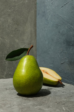 Fresh green pears on gray background, space for textの写真素材