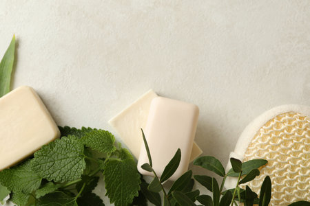 Concept of personal hygiene with natural soap on beige table