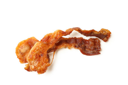 Tasty fried bacon isolated on white backgroundの写真素材