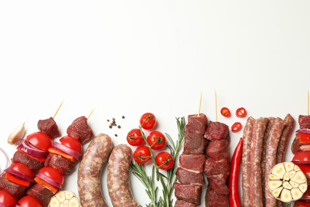 Set of different raw barbecue meat on white background, space for textの写真素材