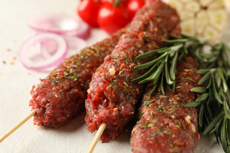 Raw lula kebab, herbs and spices, close upの写真素材