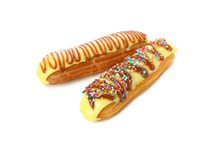 Delicious eclairs with custard isolated on white backgroundの写真素材