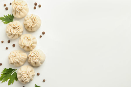 Raw khinkali, pepper and parsley on white backgroundの写真素材