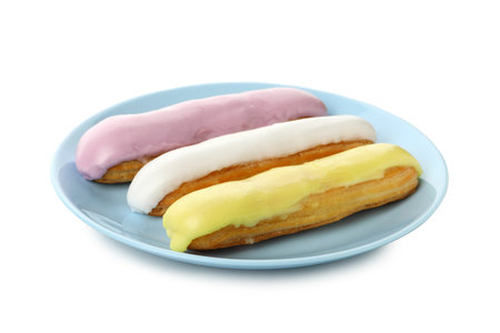 Plate with eclairs with custard isolated on white backgroundの写真素材