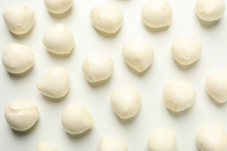 Flat lay with mozzarella cheese on white backgroundの写真素材