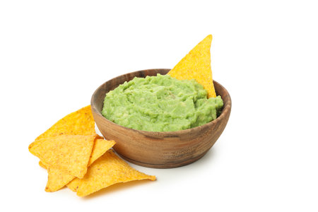 Bowl of guacamole and chips isolated on white backgroundの写真素材