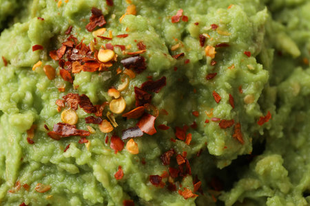 Fresh tasty guacamole with spices, close upの写真素材