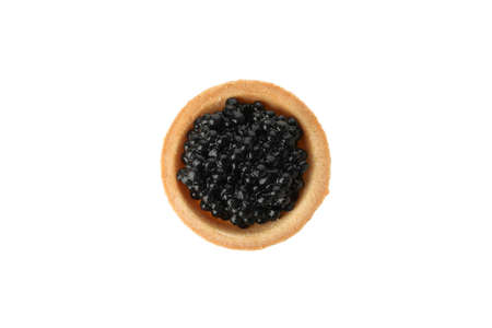 Tartlet with black caviar isolated on white backgroundの写真素材
