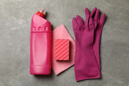 Cleaning tools on gray background, top viewの写真素材